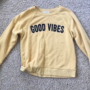 yellow “good vibes”